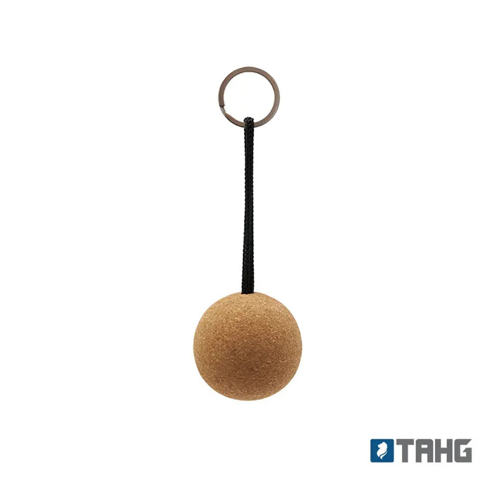 Llavero Floating de corcho natural y acero inoxidable 304 con diseño flotante para actividades náuticas y deportes acuáticos.