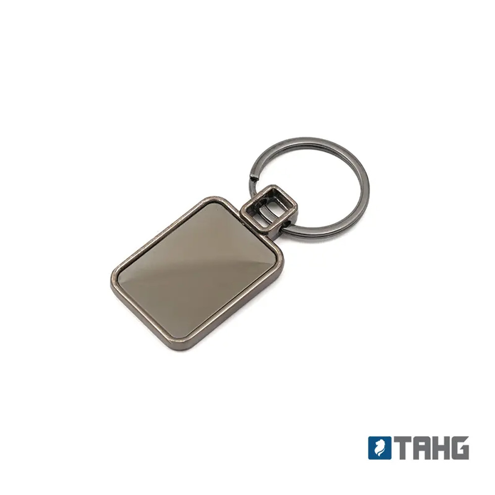 Llavero Splendour metálico rectangular de aleación de zinc con acabado brillante y superficie personalizable para logo.
